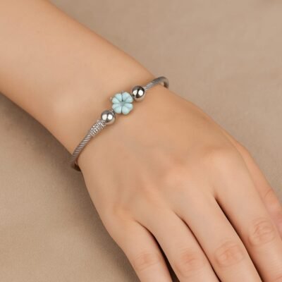 Pulsera de Acero con Flor Azul - Estilo Elegante